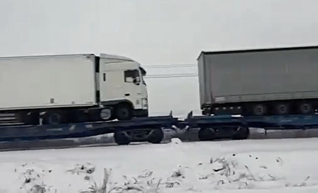 Russian invasion of Ukraine: Day 653 Ukrainian-trucks-on-rail-